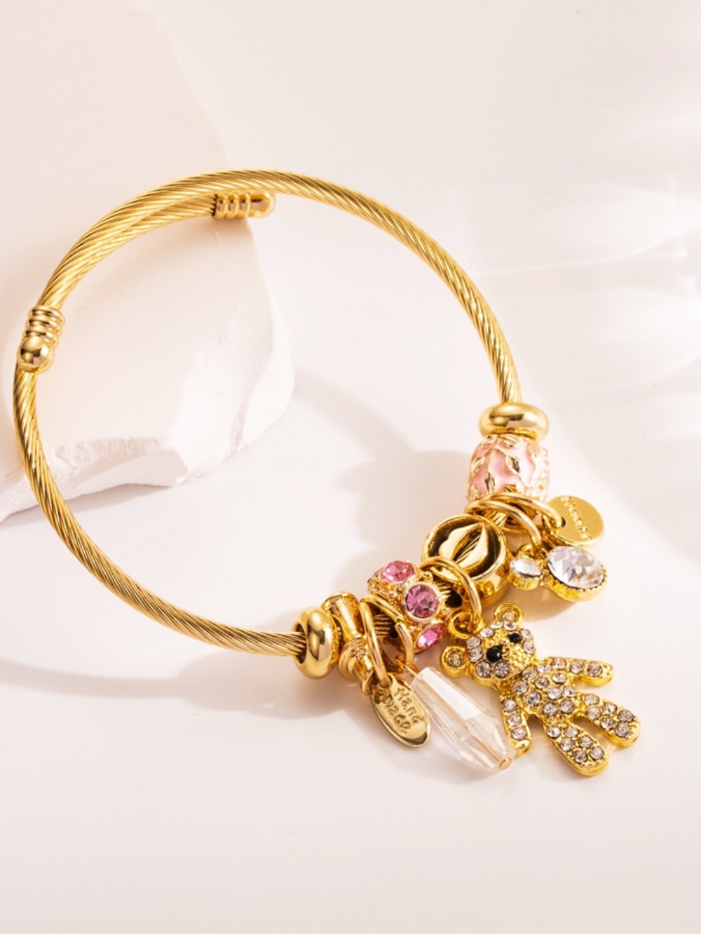 Gold Plated Charm Bangle Bracelet with Pink Crystal Accents